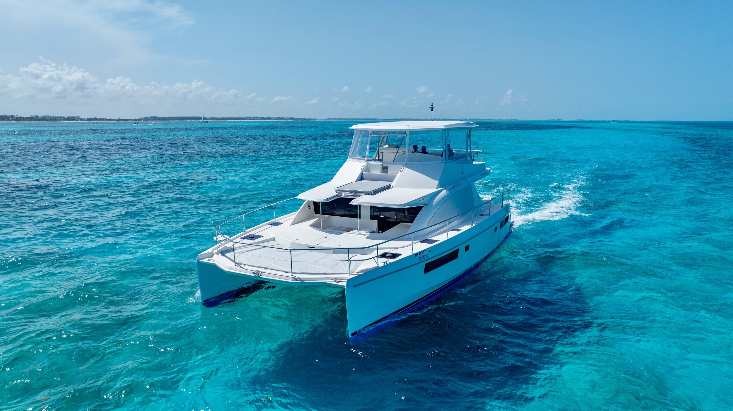 51 Ft Leopard Catamaran with flybridge Cancun by Riviera Charters 1