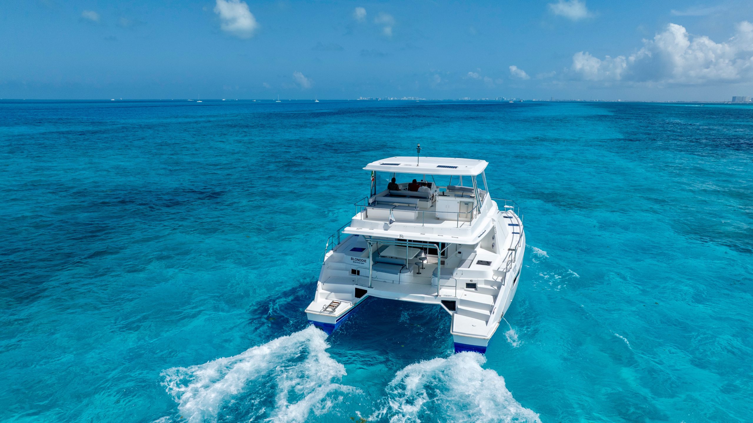 51 Ft Leopard Catamaran with flybridge Cancun by Riviera Charters 4