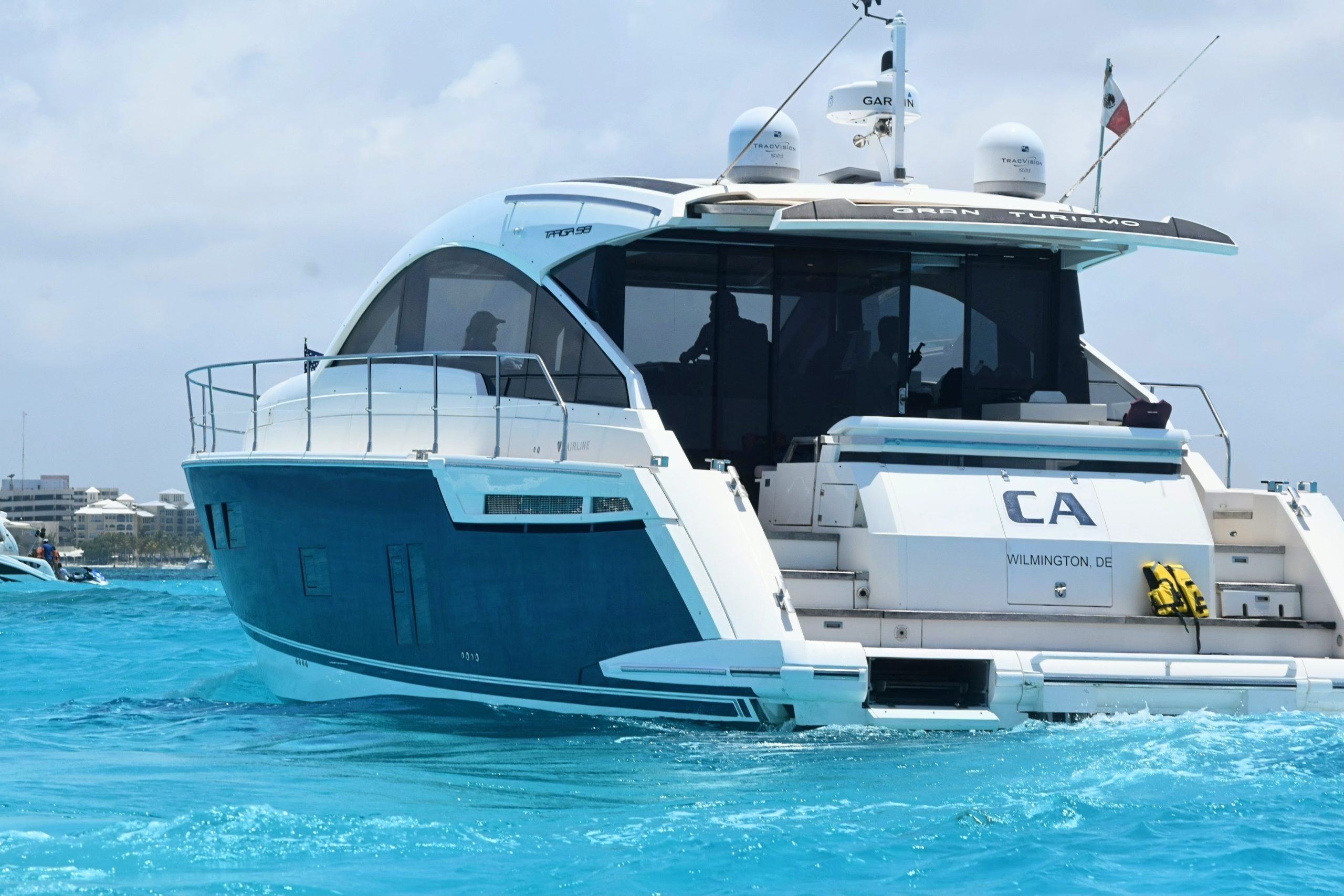 Alt Text: CA, 58 Ft Fairline Targa private yacht charter Cancun — side profile underway